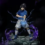 Collectible figure of a character with spiky black hair in a blue shirt and shorts, creating water-like energy effects, with a rocky base and purple energy