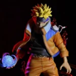 Collectible figure of a character with spiky yellow hair, wearing an orange and blue jacket, holding a glowing sphere, with fiery energy effects