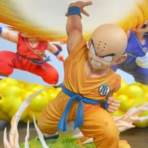 Collectible figure of a bald martial artist in orange, launching an energy blast with swirling effects, standing on a grassy base, with characters in the background