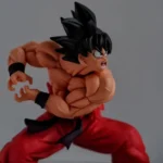 Muscular Dragon Ball King Kai Fist Goku Figure: Dynamic Action Pose with Red Pants, Spiked Black Hair & Fierce Expression - Anime Collectible