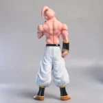 Dragon Ball - Majin Buu Statue: Kid Buu (Head-Tilted) in dynamic pose, pink muscular build, white pants & black-gold boots. Anime collectible statue.