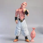 Dragon Ball - Majin Buu Statue: Kid Buu (Head-Tilted) in dynamic pose, pink muscular build, white pants with black wristbands. Anime collectible figure.