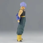 Dragon Ball - Purple Hair Trunks Figure - Muscular anime model with purple hair, black sleeveless top, dark pants, yellow boots, dynamic pose on solid gray background, vibrant anime-style collectible.