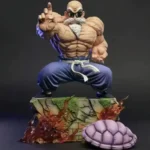 Dragon Ball Statue: Muscular blue-gi warrior in dynamic pose, intricate base with destruction and purple energy effects.