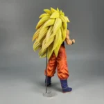 Dragon Ball Z Goku Statue - SSJ3 Goku Red Outfit Figure with spiky yellow hair, orange pants, blue boots, dynamic pose on stand.