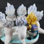 Dragon Ball Z Statue - Mini Ghost Gotenks Statue with golden spiked hair, purple gi, translucent wings, and dynamic pose | Collectible figure.